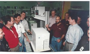 Image 1 - Michael Dell and team members in the original factory with an early PowerEdge server.jpg